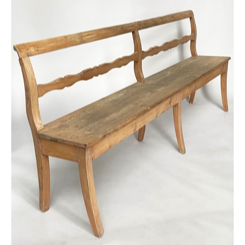 172 - HALL BENCH, 19th century French provincial pine with raised bar back and swept front supports, 214cm... 