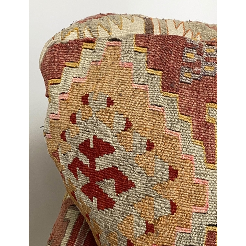 157 - KILIM ARMCHAIR, early 20th century in the manner of Howard Sons with antique kilim upholstery and sq... 