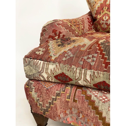 157 - KILIM ARMCHAIR, early 20th century in the manner of Howard Sons with antique kilim upholstery and sq... 