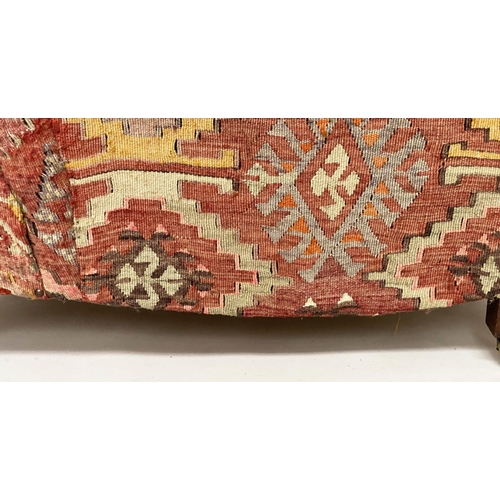 157 - KILIM ARMCHAIR, early 20th century in the manner of Howard Sons with antique kilim upholstery and sq... 