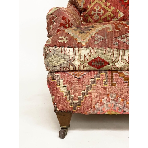 157 - KILIM ARMCHAIR, early 20th century in the manner of Howard Sons with antique kilim upholstery and sq... 