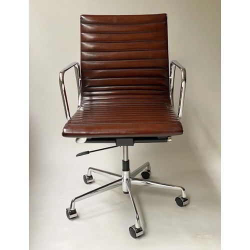 231 - REVOLVING DESK CHAIR, Charles and Ray Eames inspired with ribbed tan leather seat revolving and recl... 