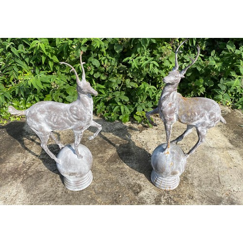 472 - ARCHITECTURAL GARDEN STAG FINIALS, a pair, cast metal, 100cm x 60cm. (2)