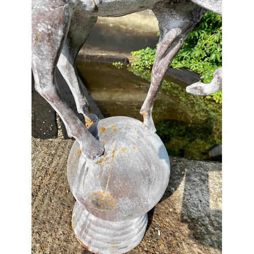 472 - ARCHITECTURAL GARDEN STAG FINIALS, a pair, cast metal, 100cm x 60cm. (2)