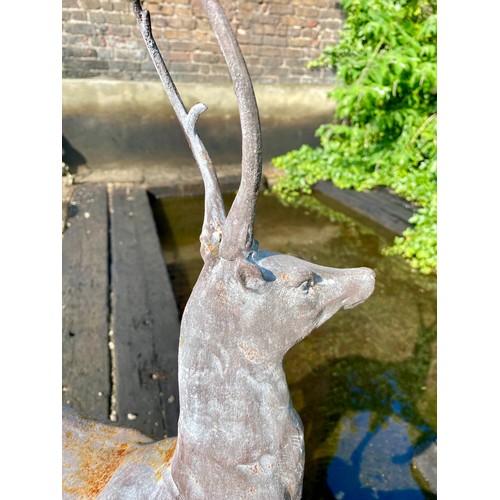 472 - ARCHITECTURAL GARDEN STAG FINIALS, a pair, cast metal, 100cm x 60cm. (2)