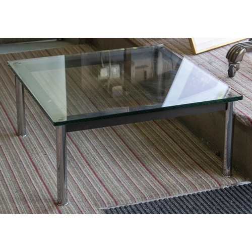 517 - CASSINA LC10 TABLE BY LE CORBUSIER, 33cm H x 70cm W, thick square glass top on chromed steel legs.