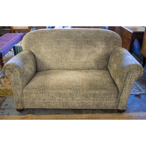 213 - DROP END SOFA, early 20th century in cut patterned grey velvet on old and modern castors.