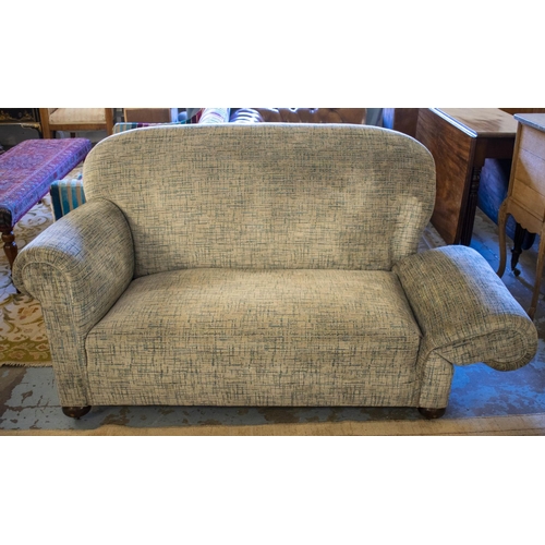 213 - DROP END SOFA, early 20th century in cut patterned grey velvet on old and modern castors.