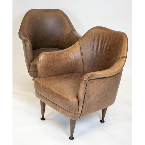 199 - ARMCHAIRS, 76cm H x 60cm, a pair, tan leather upholstered of compact proportions. (2)