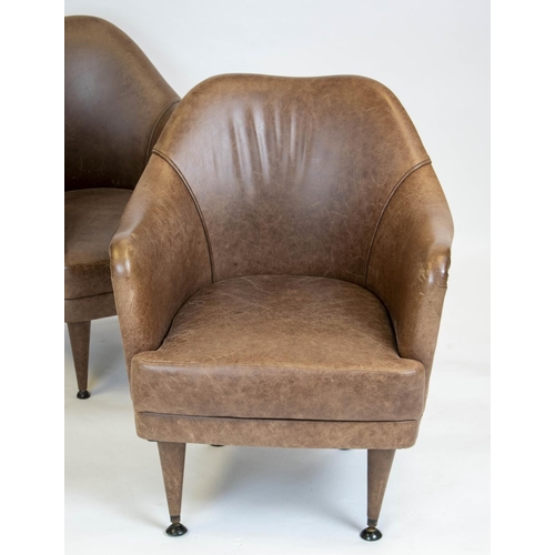 199 - ARMCHAIRS, 76cm H x 60cm, a pair, tan leather upholstered of compact proportions. (2)