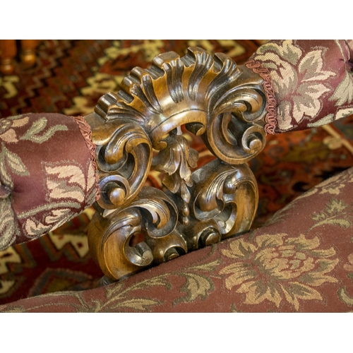 196 - SOFA, 81cm H x 193cm W, circa 1860, Victorian walnut in floral burgundy fabric on ceramic castors.