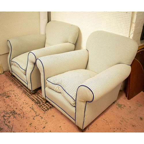 197 - ARMCHAIRS, 78cm H x 86cm W, a pair, early 20th century in new blue and white ticking on steel castor... 