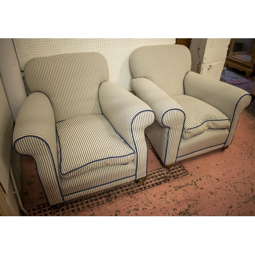 197 - ARMCHAIRS, 78cm H x 86cm W, a pair, early 20th century in new blue and white ticking on steel castor... 