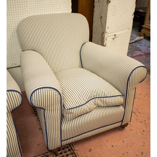 197 - ARMCHAIRS, 78cm H x 86cm W, a pair, early 20th century in new blue and white ticking on steel castor... 