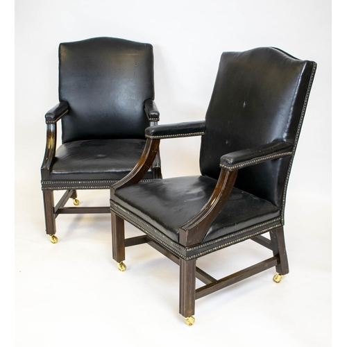 198 - GAINSBOROUGH ARMCHAIRS, a pair, 100cm H x 60cm, George III style in black leather with brass castors... 