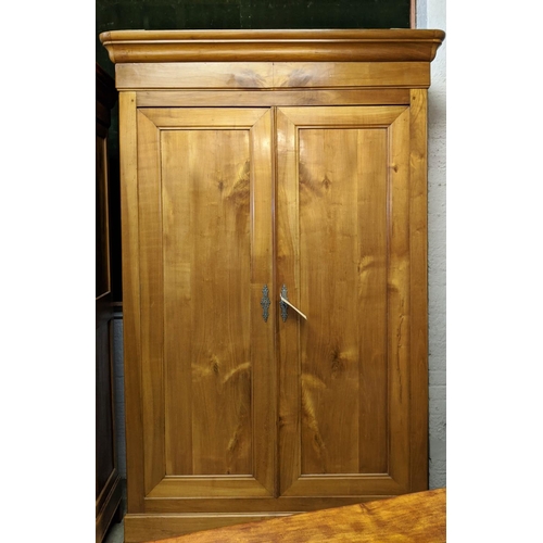 188 - ARMOIRE, mid 19th century Continental cherrywood with two doors enclosing fitted shelves and hanging... 