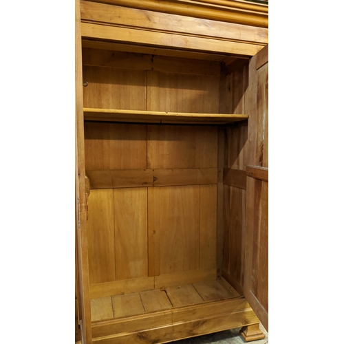 189 - ARMOIRE, mid 19th century Continental cherrywood with two doors enclosing a shelf and hanging rail, ... 