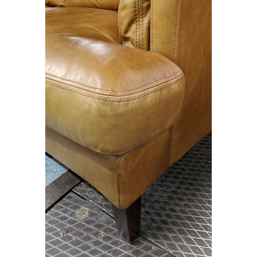 387 - JOHN LEWIS SOFA AND OTTOMAN, 210cm W, tan leather finish. (2)