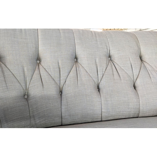 471 - SOFA, 202cm L x 84cm H with a shaped buttoned back.