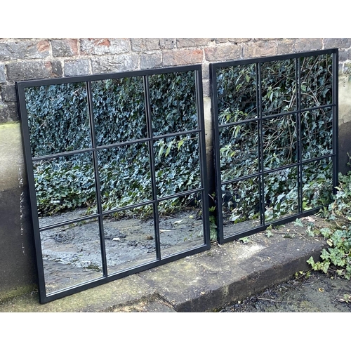 418 - ARCHITECTURAL GARDEN MIRRORS, a pair, black metal frames, 90cm x 99cm.