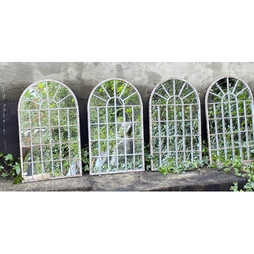 421 - ARCHITECTURAL GARDEN MIRRORS, a set of 4, arched top aged metal frames, 60cm x 36cm.