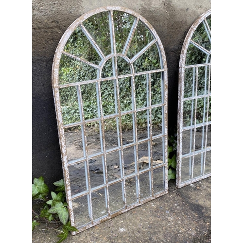 421 - ARCHITECTURAL GARDEN MIRRORS, a set of 4, arched top aged metal frames, 60cm x 36cm.