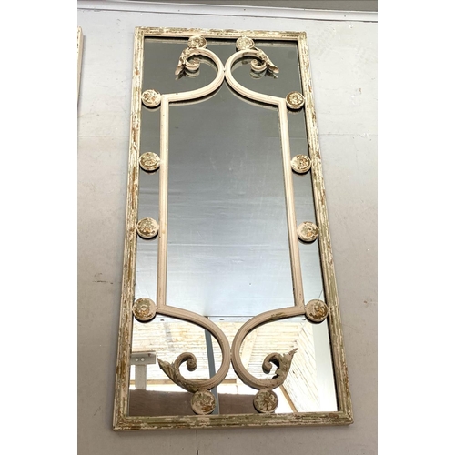 425 - ARCHITECTURAL WALL MIRRORS, a pair, aged metal frames, Italian style design, 112cm x 48cm.