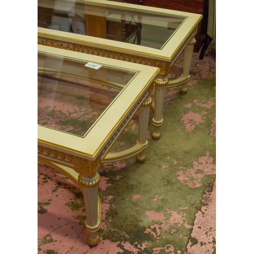 231 - LOW TABLES, a pair, each 120cm x 60cm x 48cm H Louis XVI style white painted and gilt with glass top... 