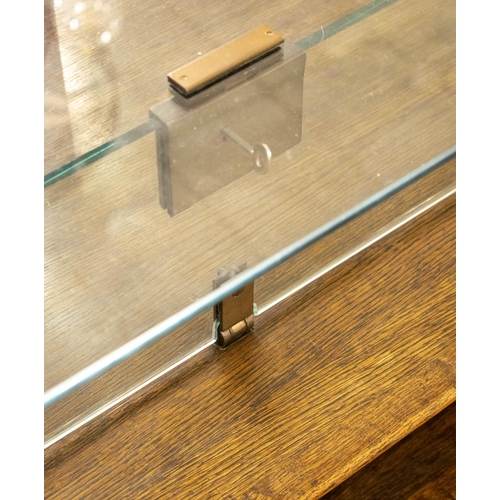 168 - MUSEUM DISPLAY CASE, 53cm H x 175cm x 75cm, vintage oak, glass and brass with canted corners, single... 