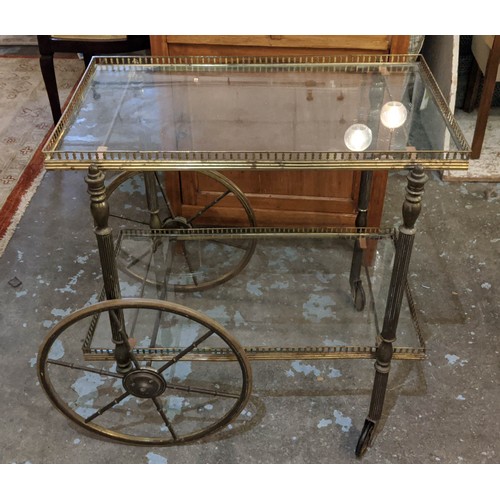 158 - TROLLEY, 73cm x 67cm H x 52cm two tier, each  with a brass gallery and a glass top.