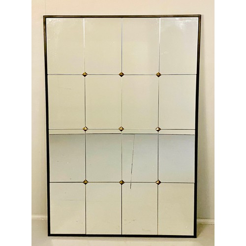 435 - ARCHITECTURAL WALL MIRROR, segmented plate enclosed in black frame, gilt stud detail, 120cm x 70cm.