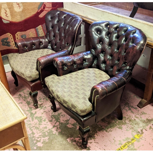 159 - ARMCHAIRS, a pair, 72cm W x 85cm H with a buttoned leather back and a loose patterned seat cushion. ... 