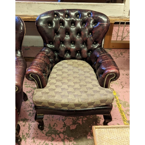 159 - ARMCHAIRS, a pair, 72cm W x 85cm H with a buttoned leather back and a loose patterned seat cushion. ... 