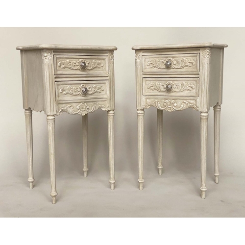 128 - TABLES DE NUIT, a pair, early 20th century Louis XVI style carved and grey painted each wih two draw... 