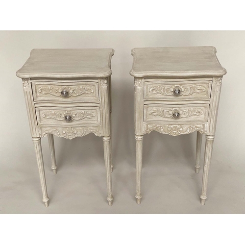 128 - TABLES DE NUIT, a pair, early 20th century Louis XVI style carved and grey painted each wih two draw... 