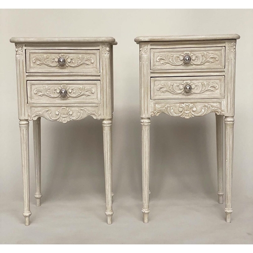 128 - TABLES DE NUIT, a pair, early 20th century Louis XVI style carved and grey painted each wih two draw... 