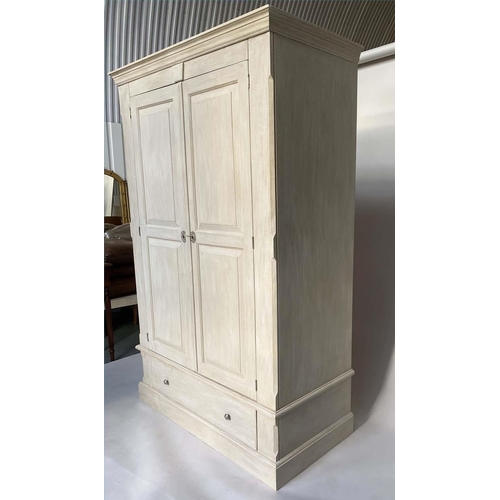 130 - ARMOIRE, French traditionally grey painted with two panelled doors enclosing hanging space above a f... 