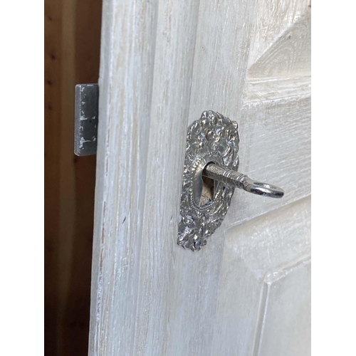 130 - ARMOIRE, French traditionally grey painted with two panelled doors enclosing hanging space above a f... 