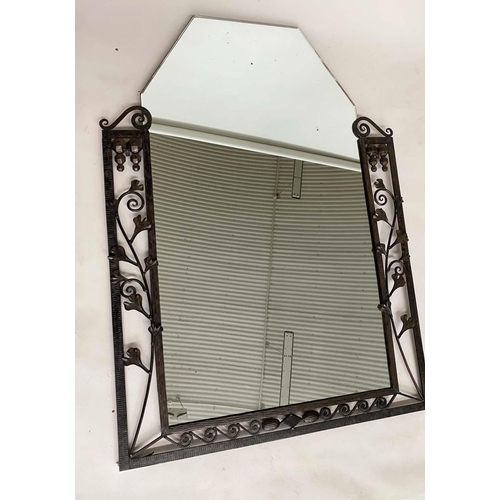 141 - ART DECO WALL MIRROR, French bevelled tapering mirror within a wrought iron foliate and Vitruvian sc... 