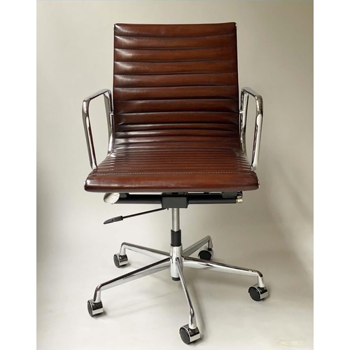 147 - REVOLVING DESK CHAIR, Charles and Ray Eames inspired ribbed tan leather seat revolving and reclining... 