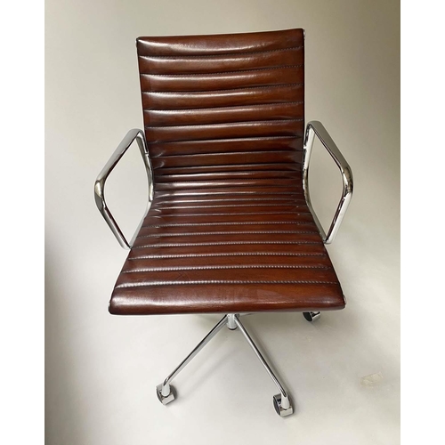 147 - REVOLVING DESK CHAIR, Charles and Ray Eames inspired ribbed tan leather seat revolving and reclining... 