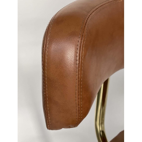 253 - JOHANSON DESIGN SWEDISH BAR STOOLS, a pair, with leather back and seat and gilt brass support, 107cm... 