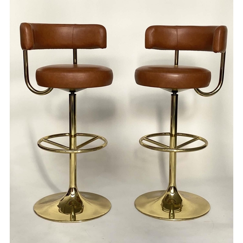 253 - JOHANSON DESIGN SWEDISH BAR STOOLS, a pair, with leather back and seat and gilt brass support, 107cm... 