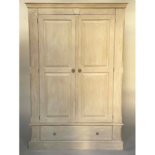 130 - ARMOIRE, French traditionally grey painted with two panelled doors enclosing hanging space above a f... 