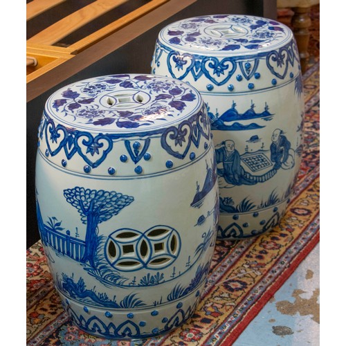 161 - GARDEN SEATS, a pair, 33cm diam x 44cm H Chinese style blue and white foliate decorated with figures... 