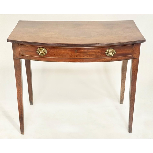 146 - BOWFRONT WRITING TABLE, George III period mahogany with full width frieze drawer and square tapering... 