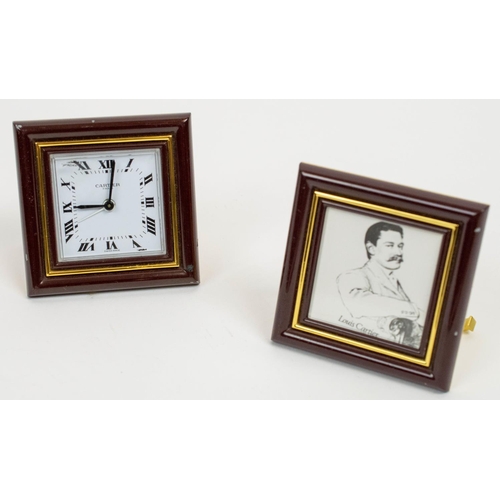 12 - CARTIER TRAVELLING CLOCK, AND PICTURE FRAME, Le Must 1970s in burgundy enamel. (2) 8cm x 8cm