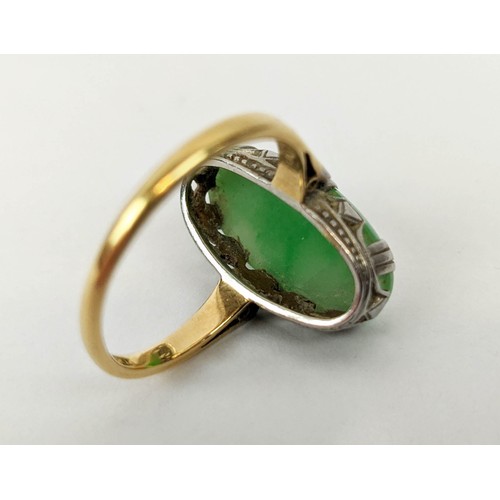 8 - AN 18CT GOLD AND JADE SET DRESS RING, the single jade cabouchon in a white metal pierced setting, ri... 