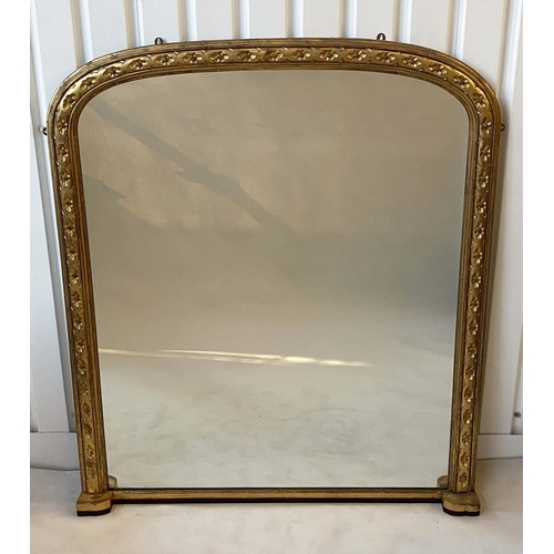 189 - OVERMANTEL MIRROR, late 19th century English carved giltwood with arched moulded frame and recessed ... 