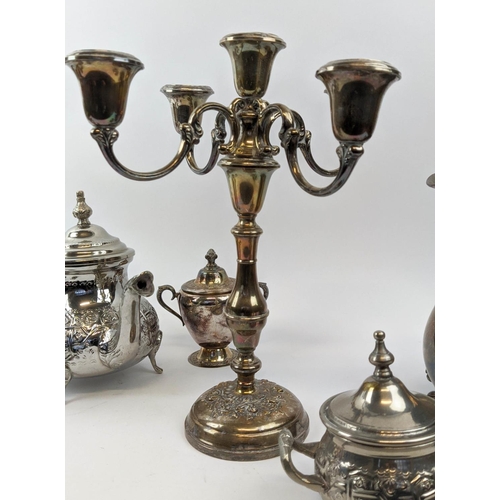 10 - COLLECTION OF SILVER PLATED WARE, comprising pair of candelabrum, part tea set, including teapot, wa... 